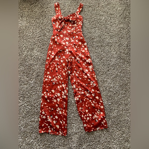 NWOT ADELYN RAE BOW FRONT ABSTRACT JUMPSUIT - Picture 4 of 9